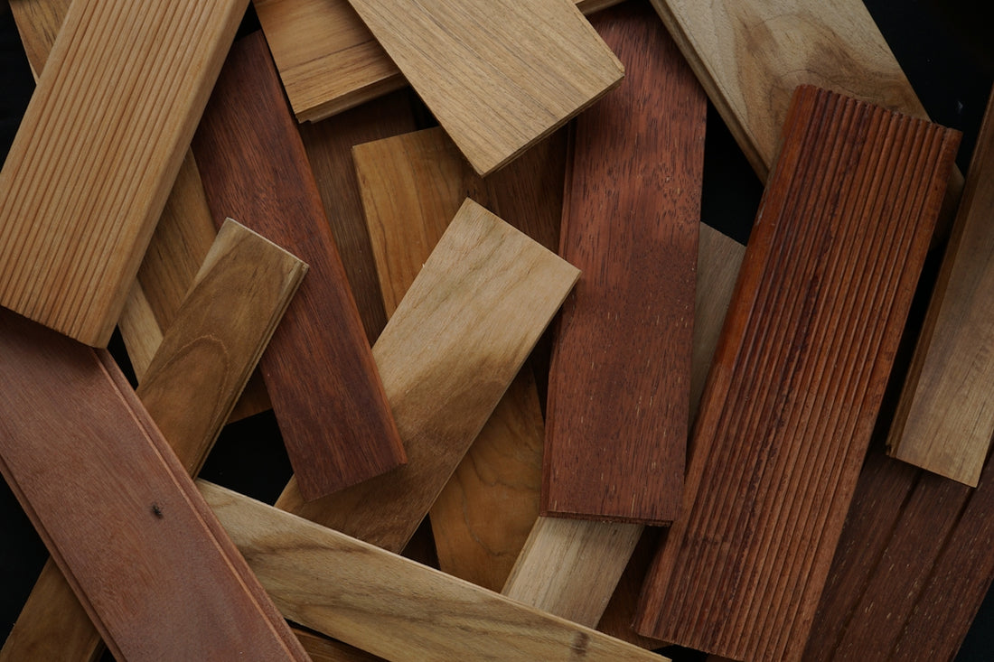 a pile of wooden planks laying on top of each other