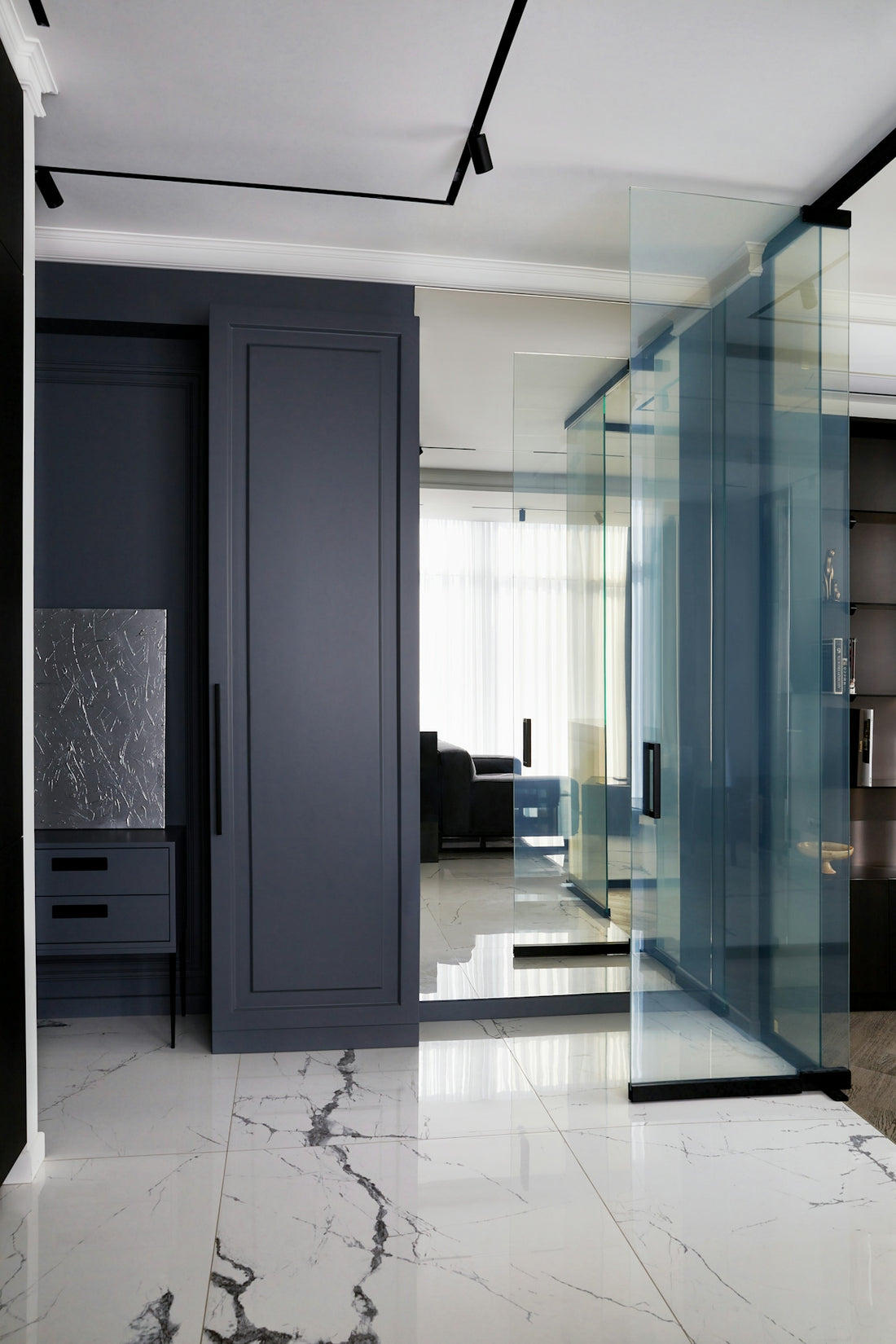Modern interior with glass walls and marble floor